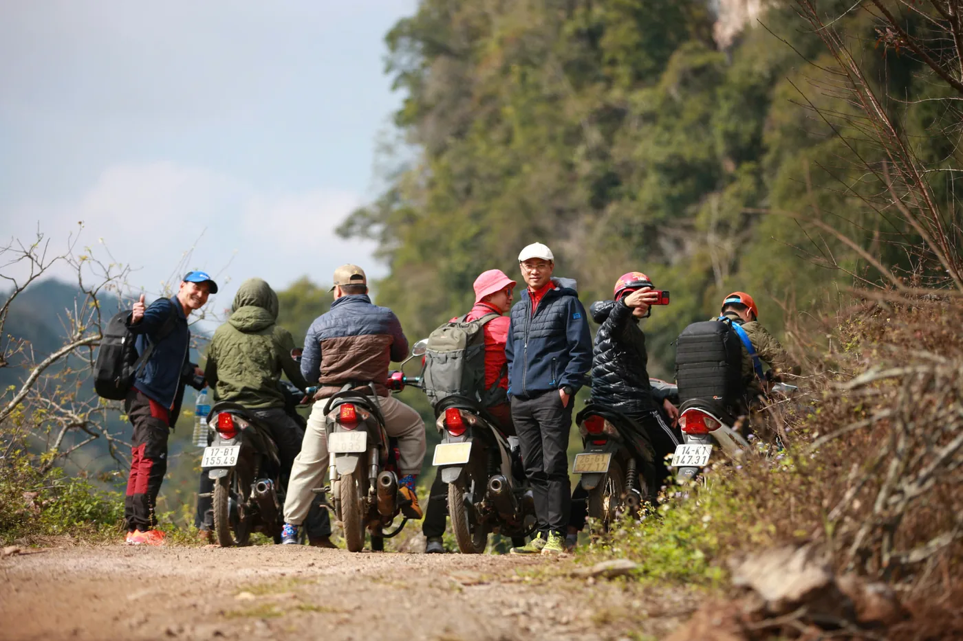 The BIBPIX crew scouting a mountain course by motorbike before a trail race